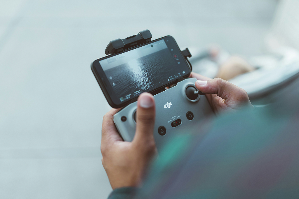 A person handling a drone.